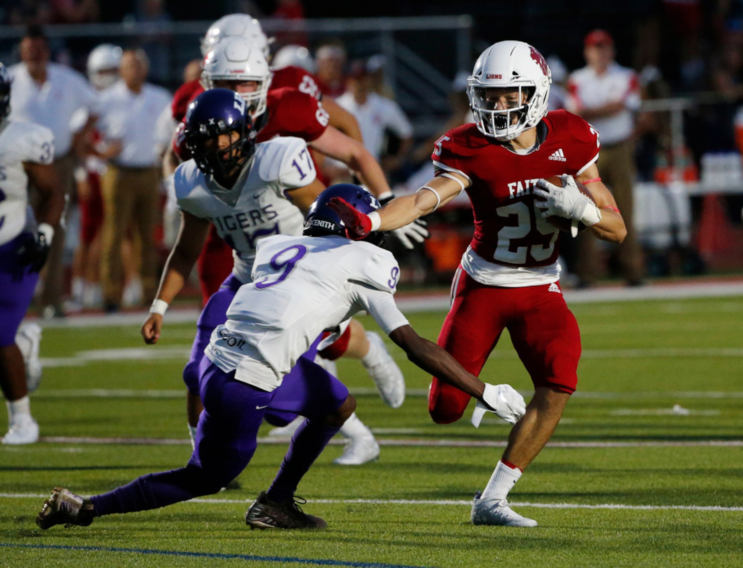 Lincoln's Jeremiah Mitchell (9) tries to tackle Grapevine Faith Christian's Mark Saunders...