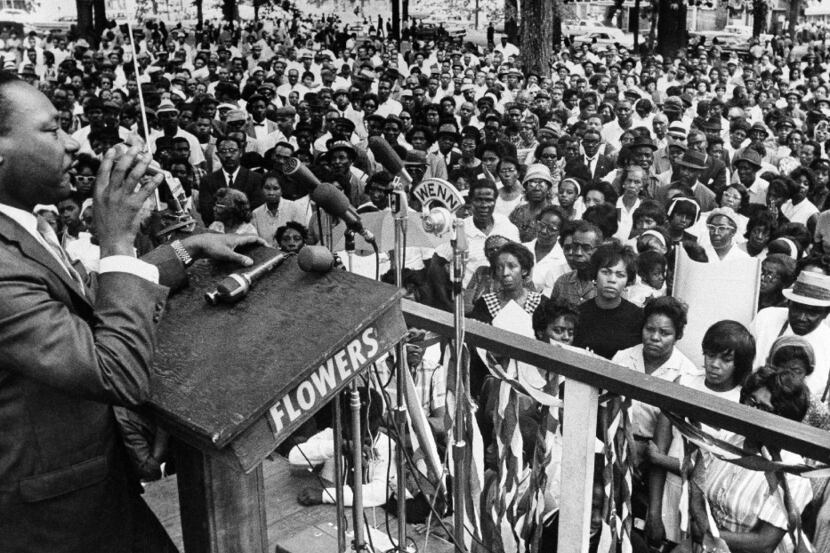 FILE - The Rev. Martin Luther King Jr. addresses a crowd of some 3,000 persons in...