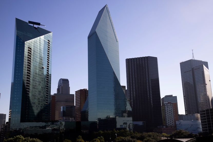 The exterior of 45-story AMLI Fountain Place apartment tower (left) and the 60-story...