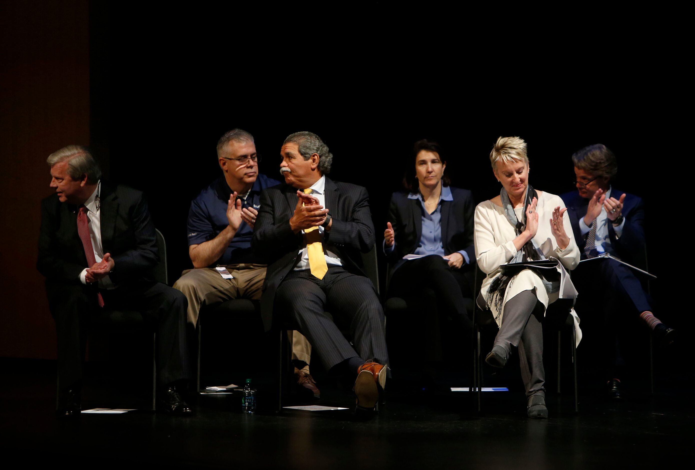 DISD Superintendent Michael Hinojosa, center, celebrates the Collegiate Academies Industry...