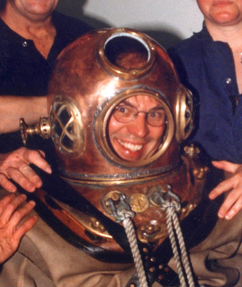 Steve Blow donned an antique diving suit -- and tested it out in a pool under supervision of...