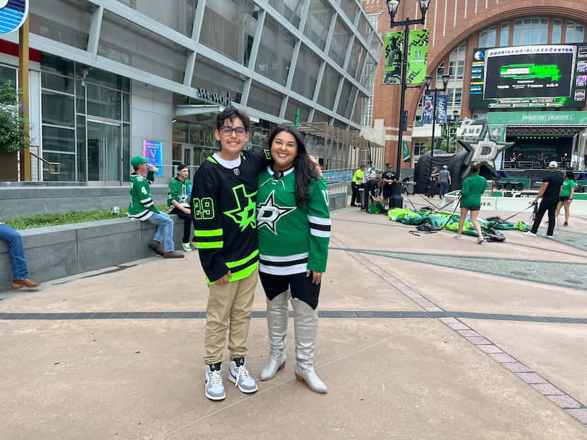 Gabrielle De La Parra and her son Malaki Hernandez pose for a photo ahead of Game 1 of the...
