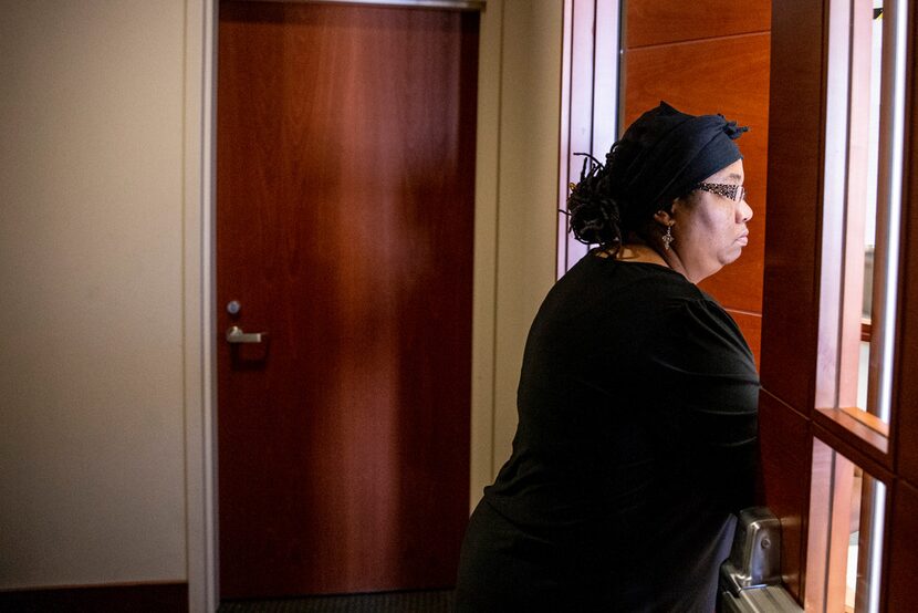 Stacey Jackson leaves the courtroom on Monday during a brief recess at George Allen...