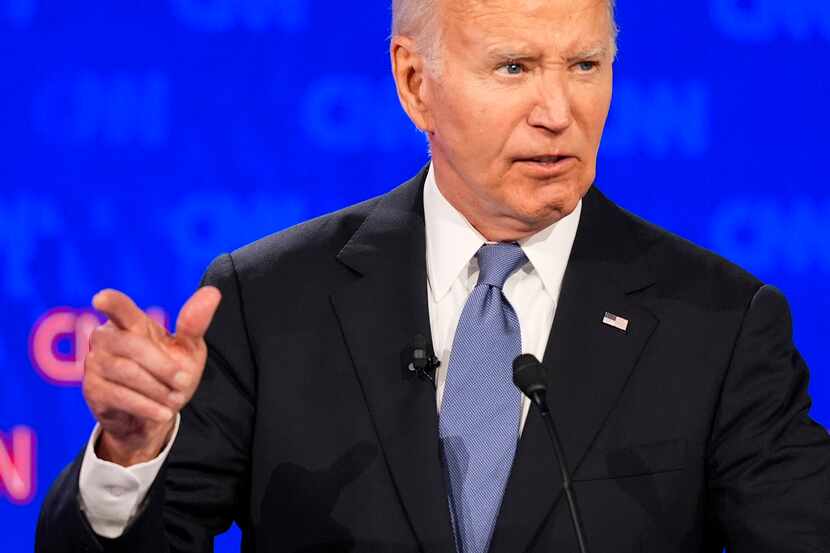 President Joe Biden speaks during a presidential debate hosted by CNN with former President...