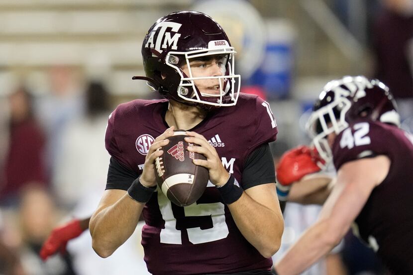 Texas A&M quarterback Conner Weigman (15) looks to pass down field against Mississippi...