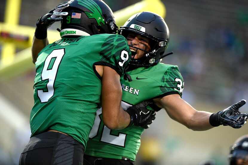 North Texas Mean Green wide receiver Jalen Guyton (9) celebrates with wide receiver Michael...