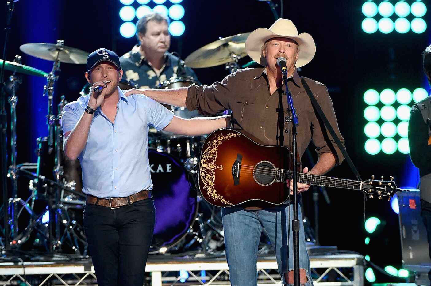 Musicians Cole Swindell (left) and Alan Jackson perform onstage during ACM Presents:...