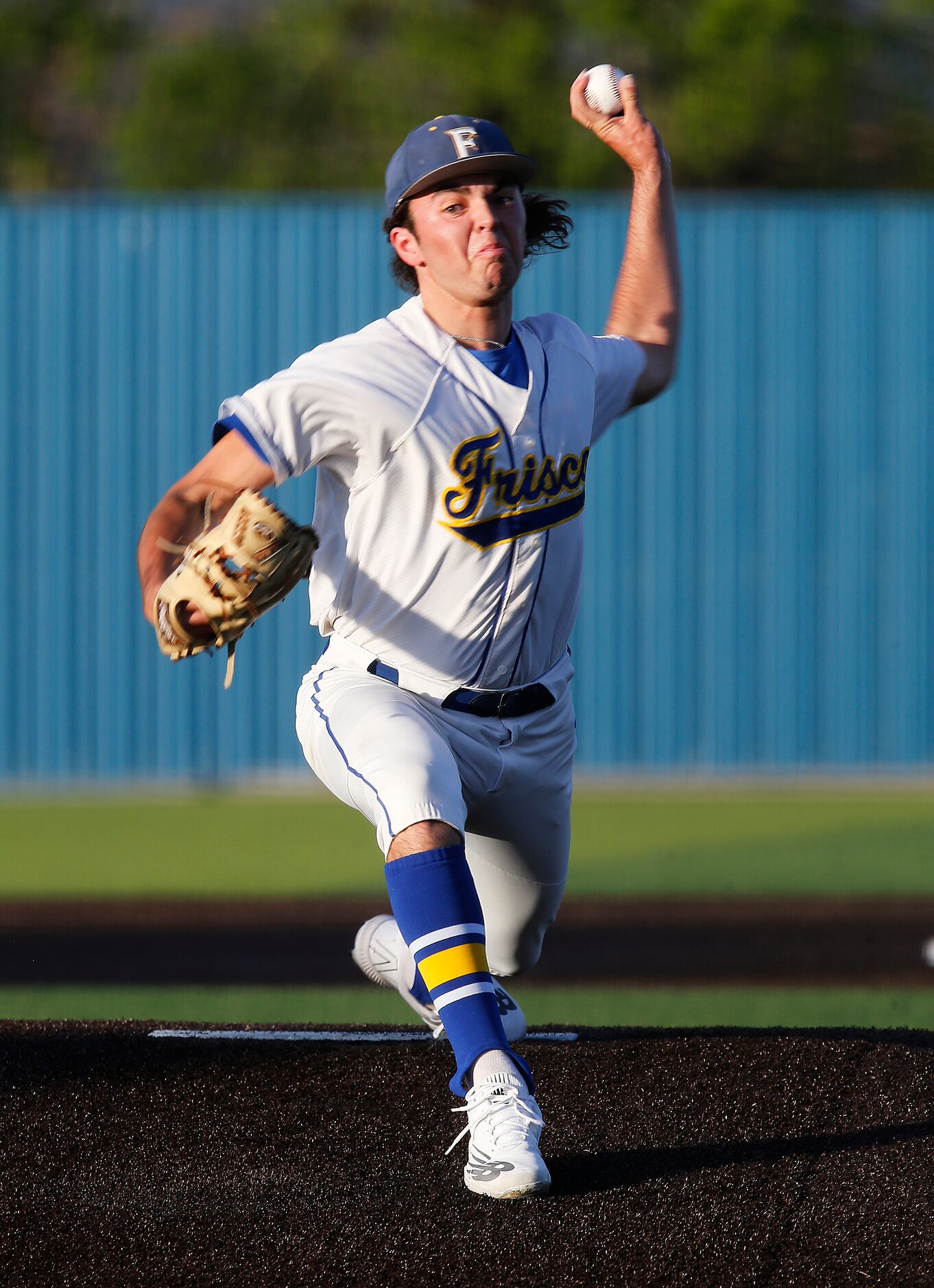 Frisco High School pitcher Rowan DeMerit (17) throws a pitch in the first inning as Frisco...