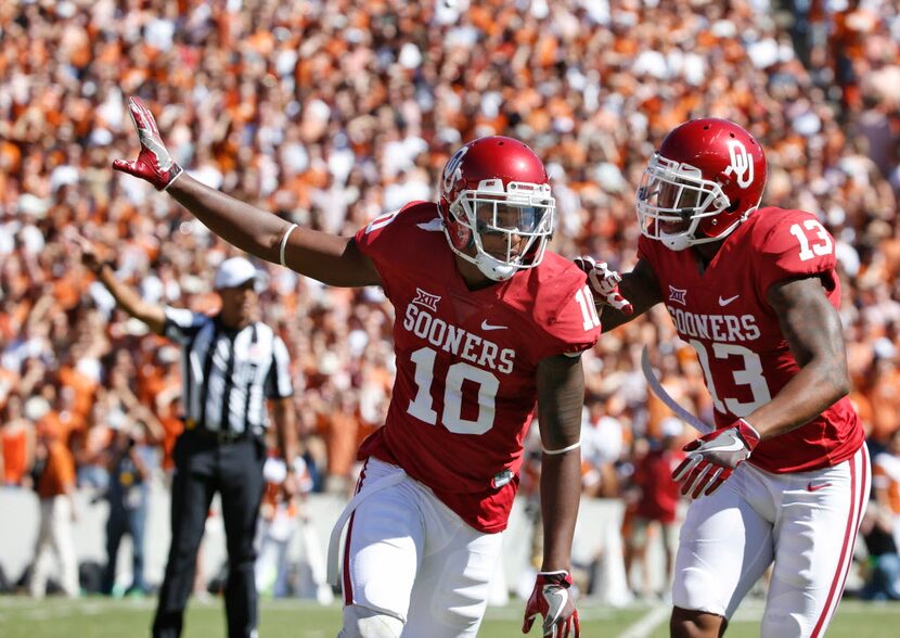 Oklahoma Sooners safety Steven Parker (10) celebrates a recovered fumble against Texas...