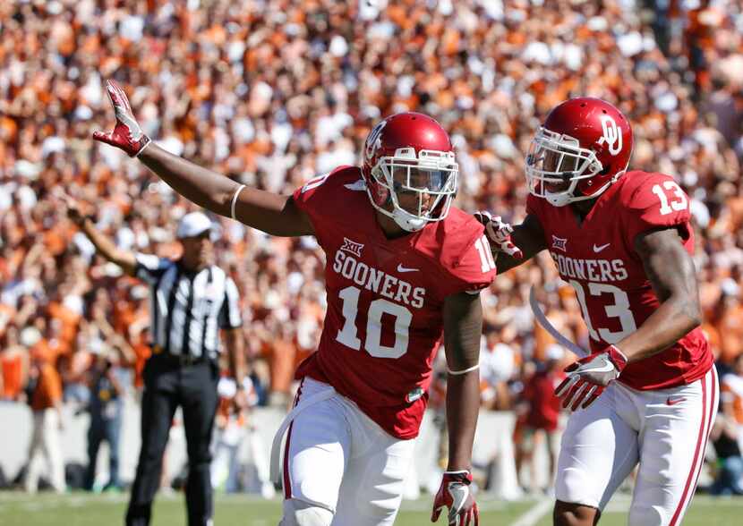 Oklahoma Sooners safety Steven Parker (10) celebrates a recovered fumble against Texas...
