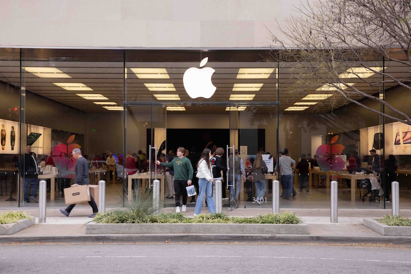 Shoppers seen at the Apple Store on Knox Street in Dallas on Monday, Dec. 23, 2024. 