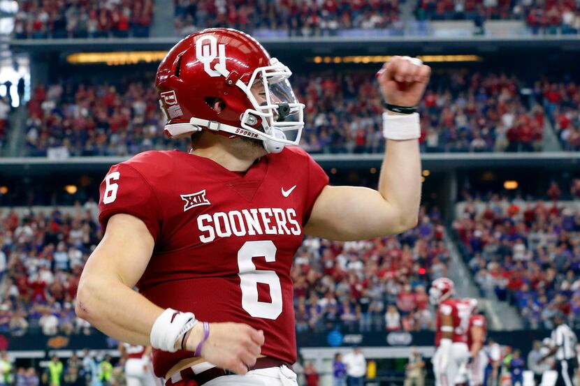 FILE - Oklahoma's Baker Mayfield (6) celebrates a fourth-quarter touchdown against TCU in...