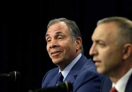 Bruce Arena, newly hired New England Revolution's coach and sports director, left, and...