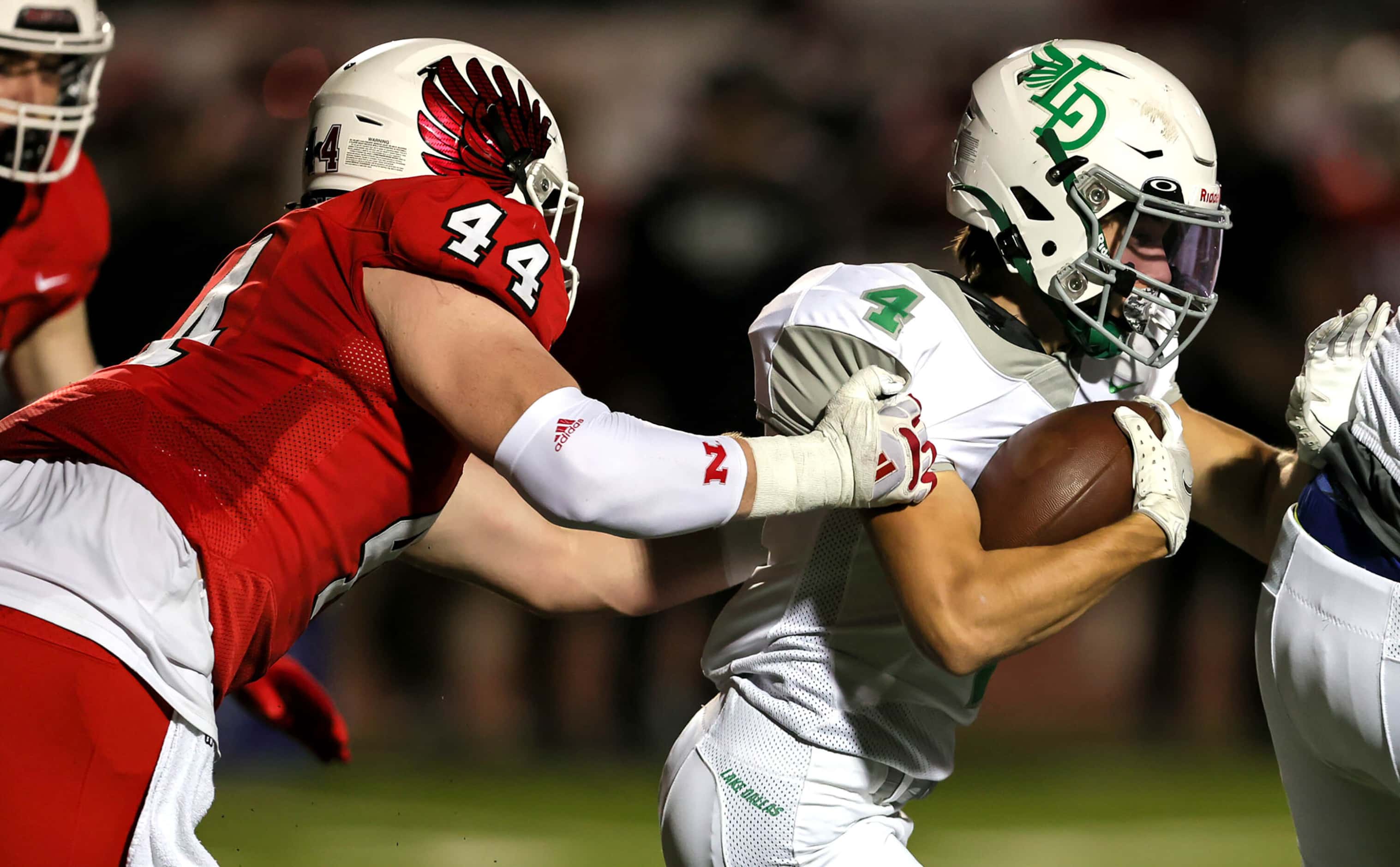 Lake Dallas running back Dylan Brauchle (4) tries to get past Argyle defensive lineman Riley...