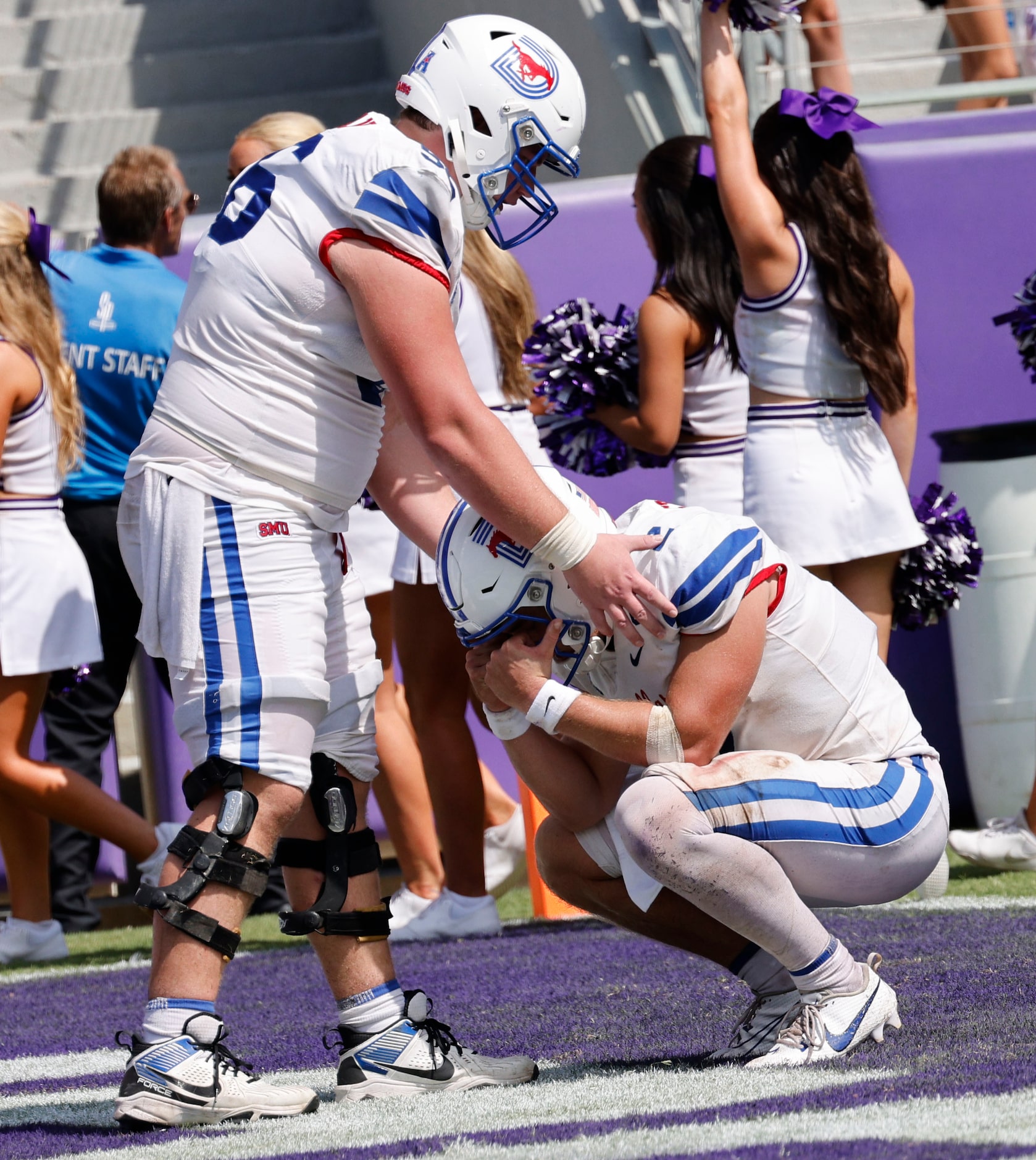 Southern Methodist Mustangs quarterback Preston Stone (2), right reacts after an NCAA...