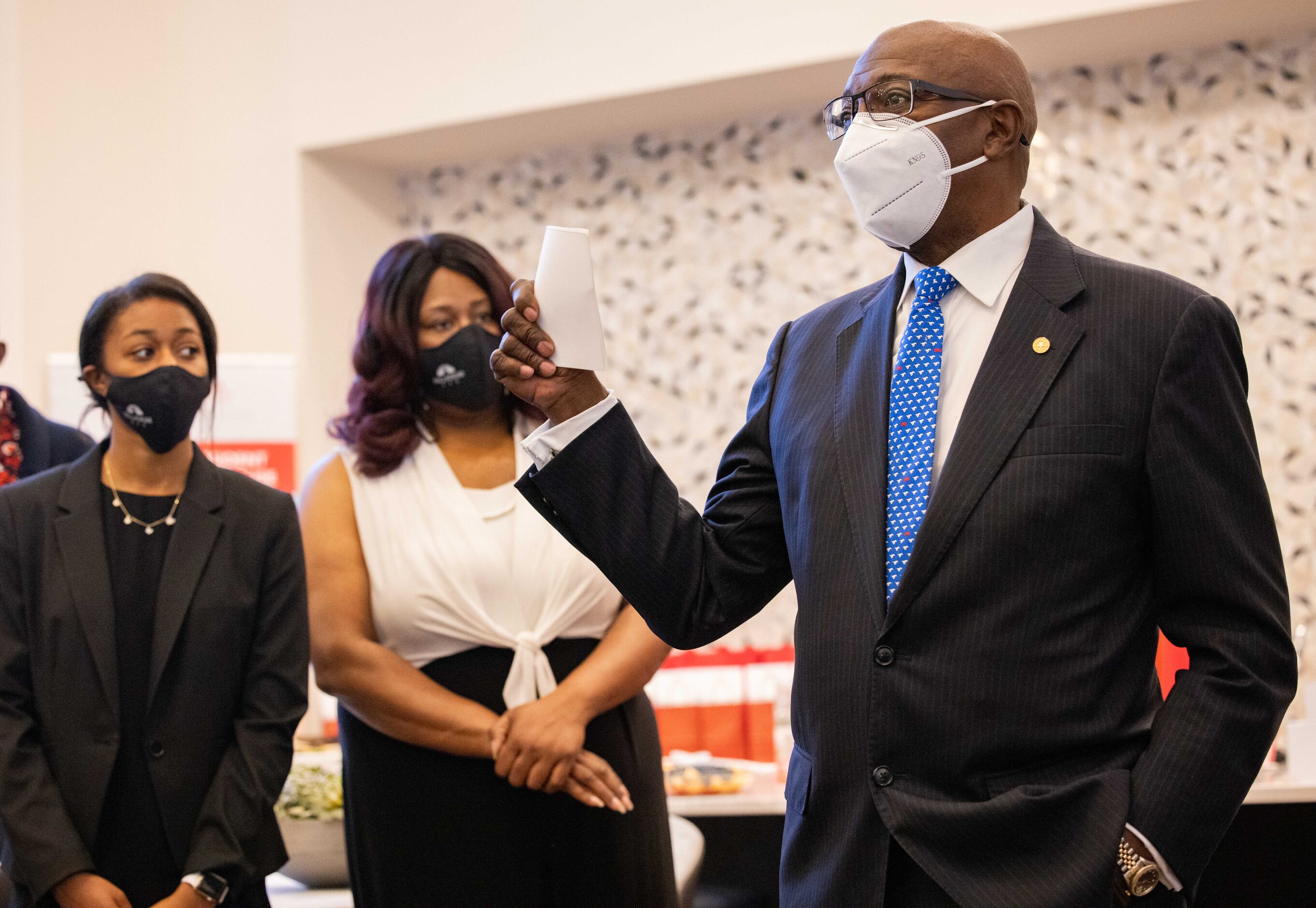 Dallas City councilman Tennell Atkins speaks at Palladium RedBird apartments on Friday.