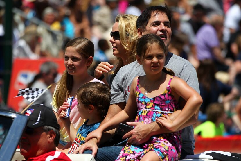 INDIANAPOLIS, IN - MAY 24:  Mark Cuban waves to the crowd during the Indianapolis 500 parade...