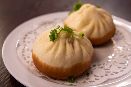 A bun dumpling with pork and scallions from Kitchen Master in Frisco