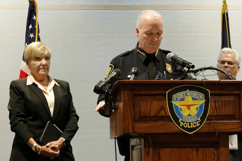 Fort Worth Mayor Betsy Price (left) listens as then-Interim Police Chief Ed Kraus addressed...