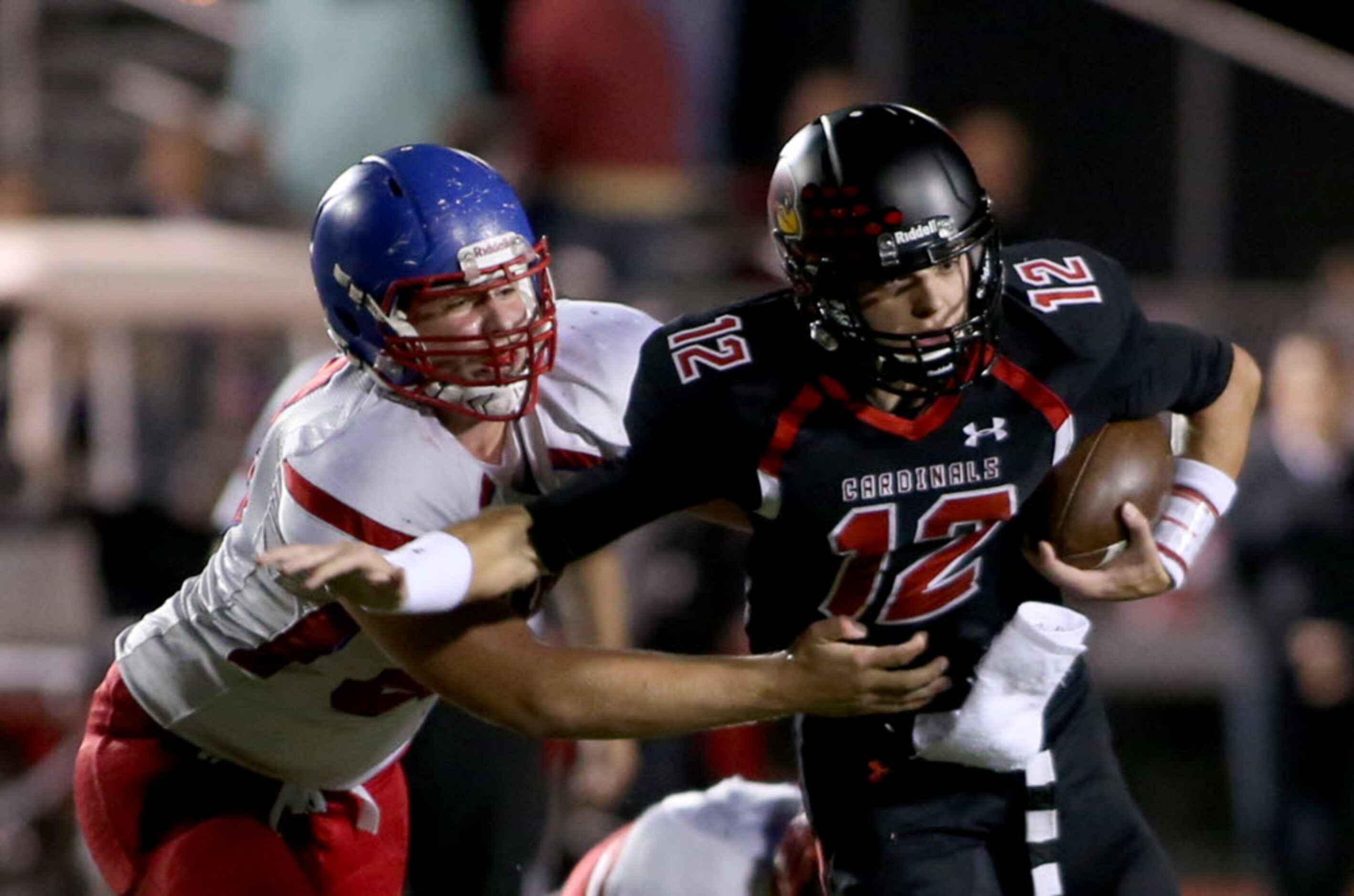 Parish Episcopal’s Jack Topping (53) tackles Fort Worth Christian’s Blaze Brownlow (12)...