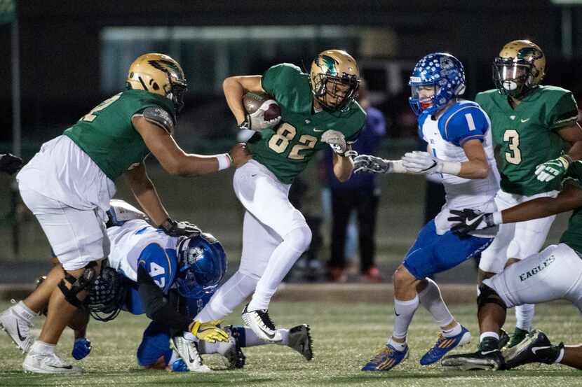 DeSoto wide receiver Lawrence Arnold (82) fights for yardage against Copperas Cove during a...