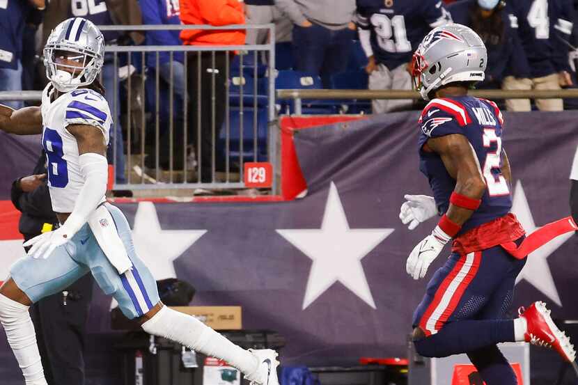 Dallas Cowboys wide receiver CeeDee Lamb (88) looks back at New England Patriots cornerback...