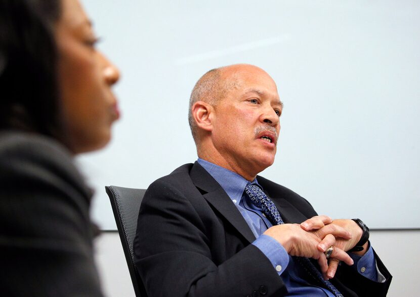 District Attorney candidate John Creuzot answers questions at an editorial board meeting at...