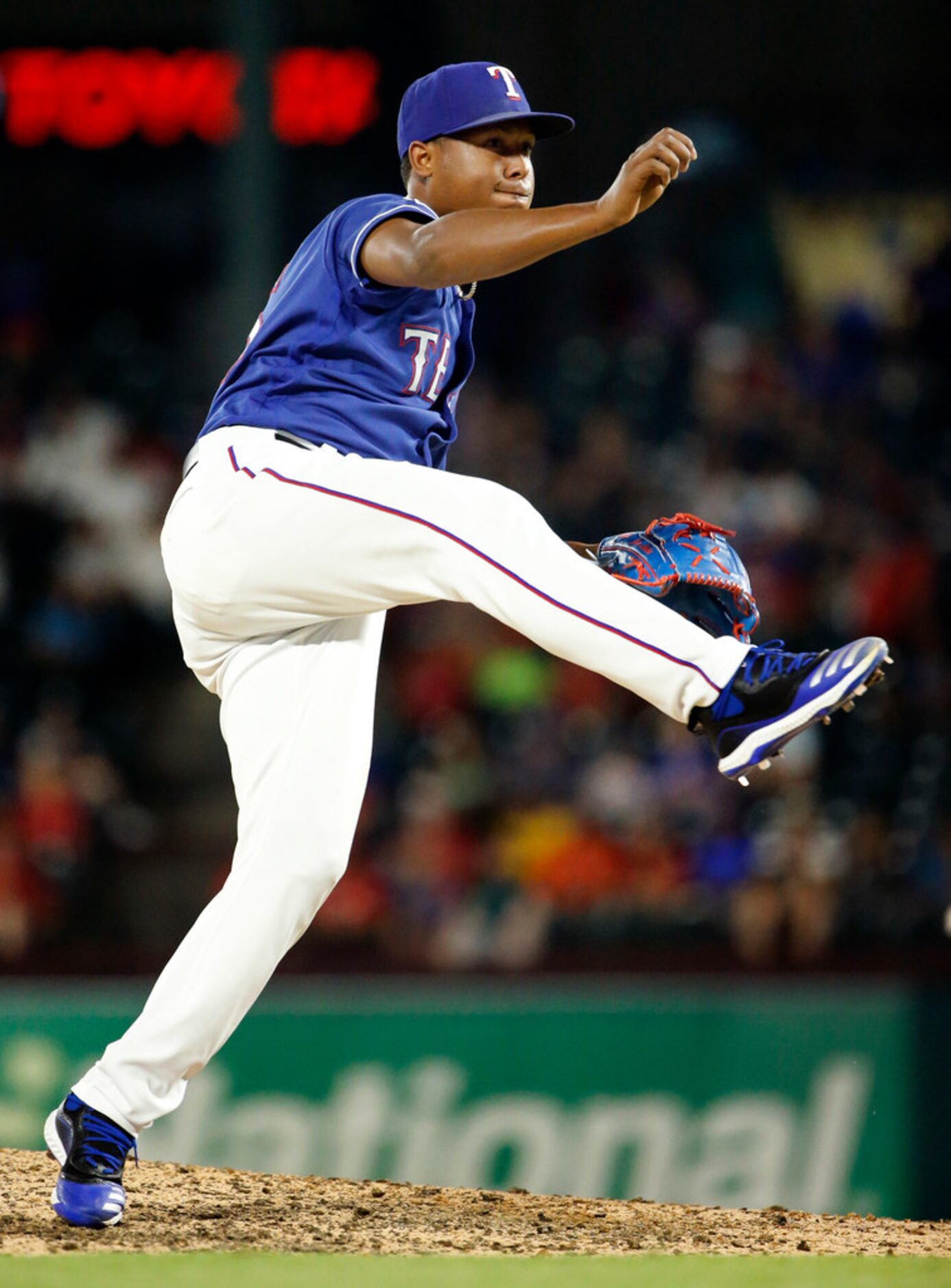 Texas Rangers relief pitcher Jose Leclerc (25) throws during the eighth inning against the...