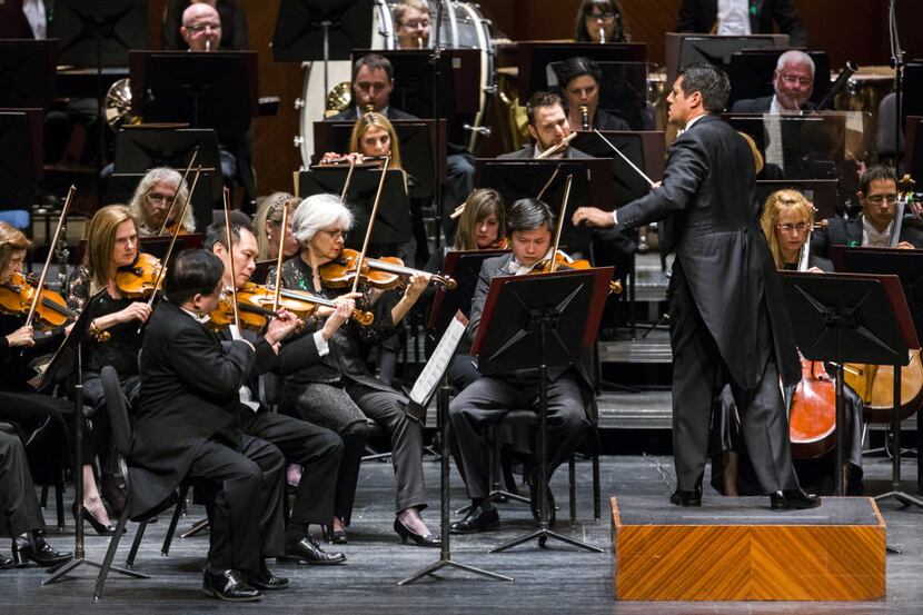 Music director Miguel Harth-Bedoya, right, conducts the Fort Worth Symphony Orchestra on...
