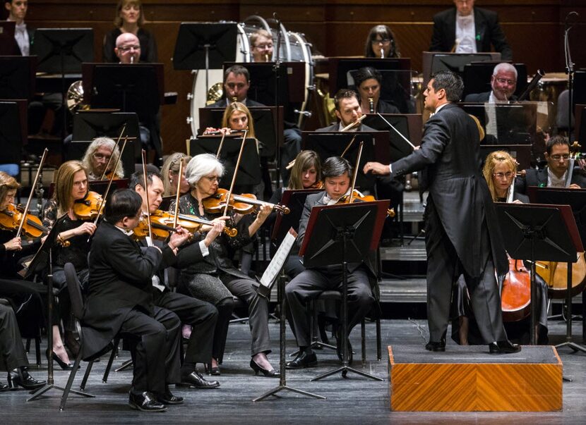 Music director Miguel Harth-Bedoya, right, conducts the Fort Worth Symphony Orchestra on...