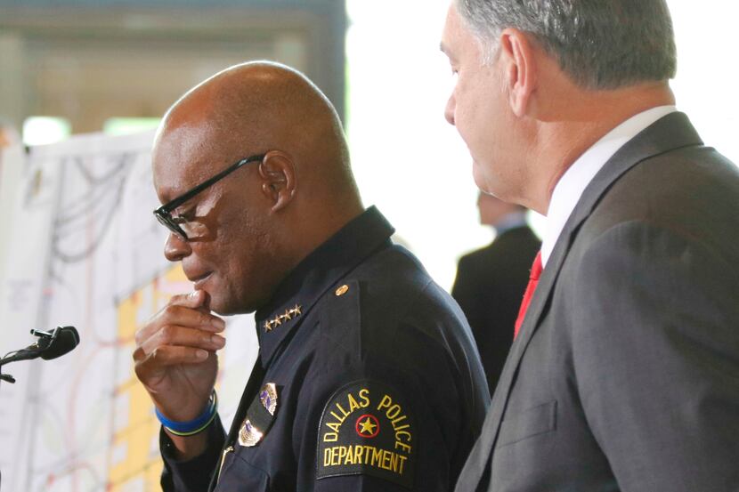 Dallas Police Chief David Brown and Mayor Mike Rawlings at a news conference on the police...