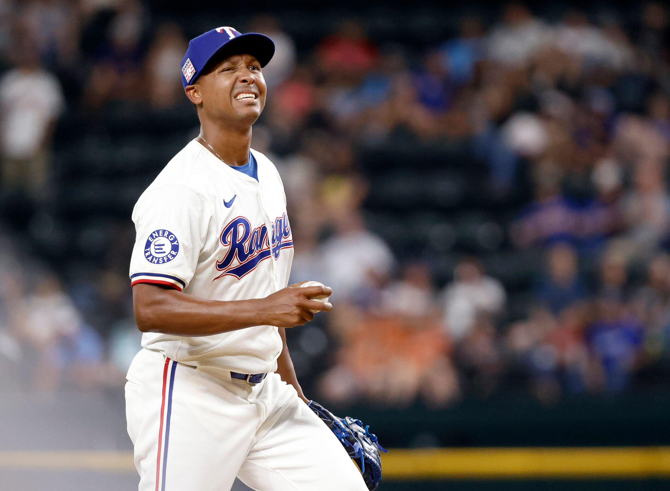 Texas Rangers pitcher José Leclerc reacts after Baltimore Orioles batter Ryan O'Hearn hit s...