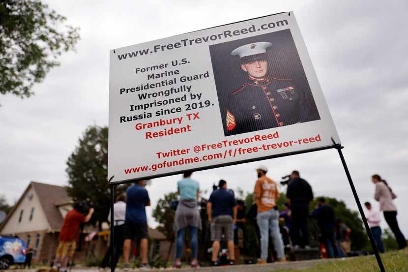 A campaign yard sign sits outside Joey and Paula Reed’s Granbury home after their son, U.S....
