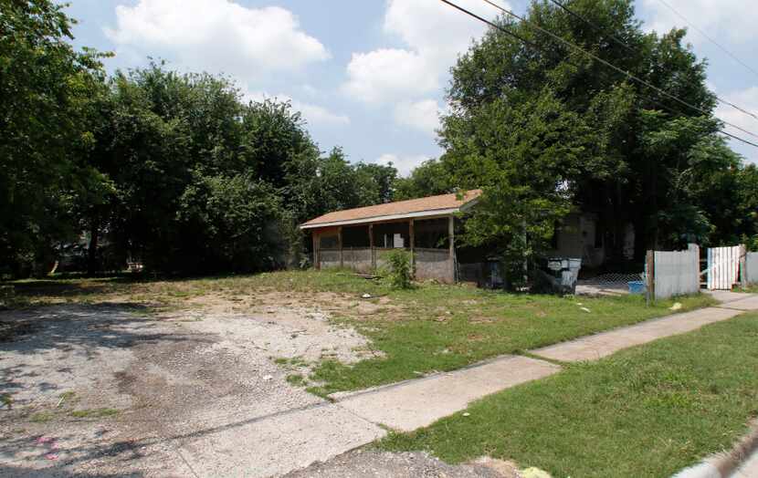 Vacant houses and scraped lots owned by HMK can now be found in West Dallas. HMK sold some...