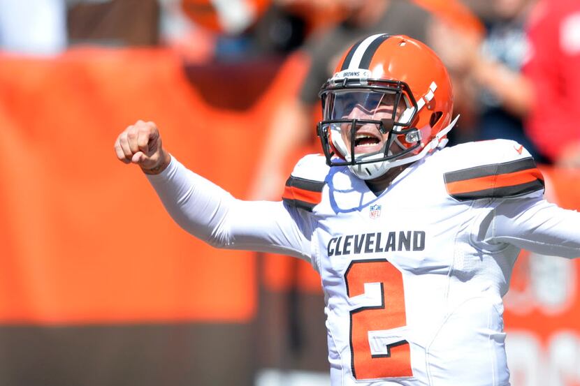 Cleveland Browns quarterback Johnny Manziel celebrates after a 60-yard touchdown pass to...