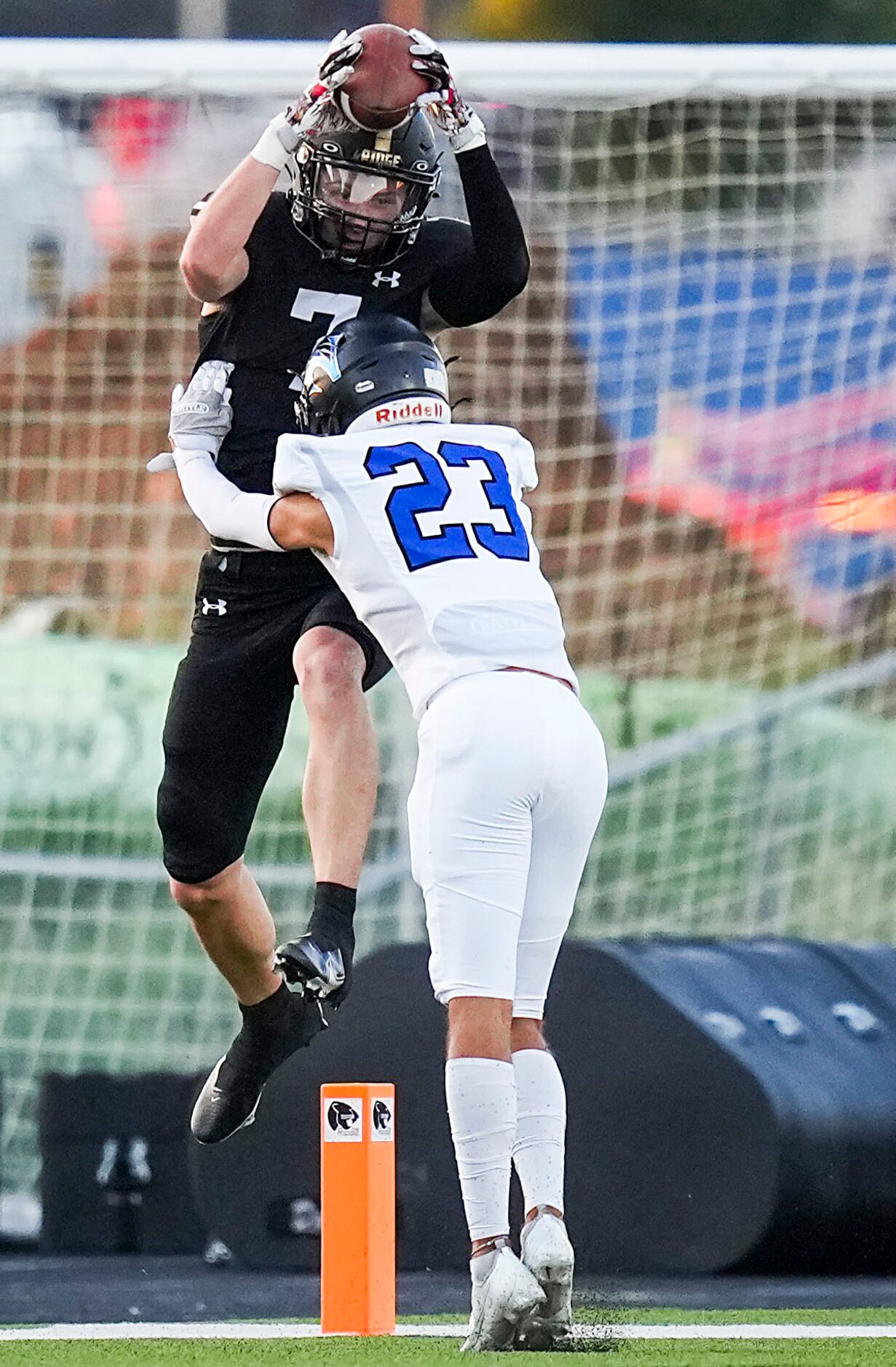 Keller Fossil Ridge wide receiver Cooper Leonard (7) catches a touchdown pass over Trophy...