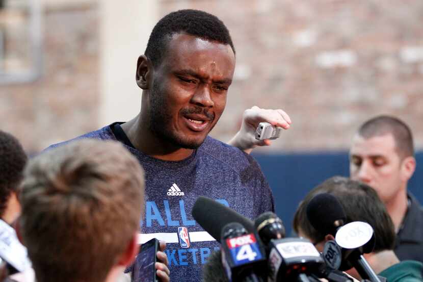 Dallas Mavericks center Samuel Dalembert (1) talks to the media the day after losing to the...
