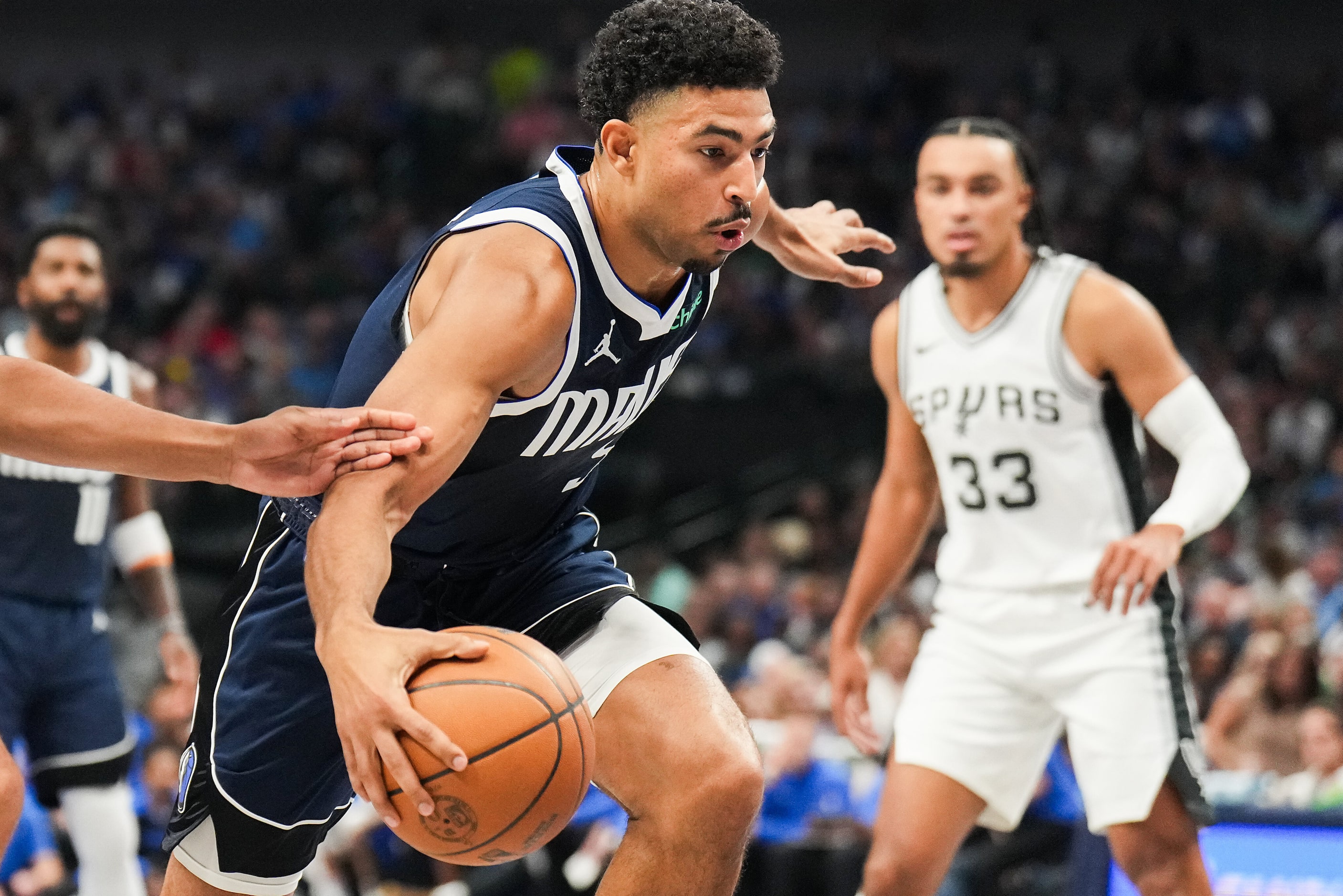 Dallas Mavericks guard Quentin Grimes (5) drives to the basket during the first half of an...