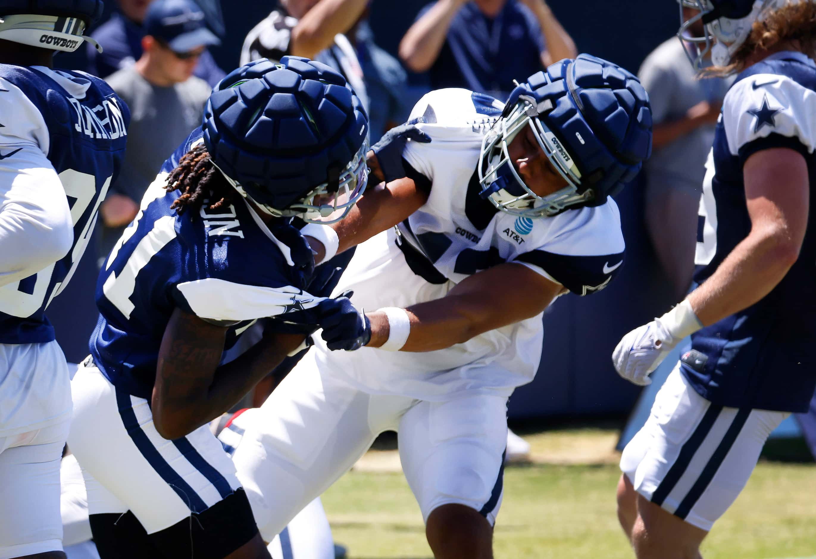 Dallas Cowboys rookies cornerback Caelen Carson (41, left) and tight end Berwyn Spann-Ford...