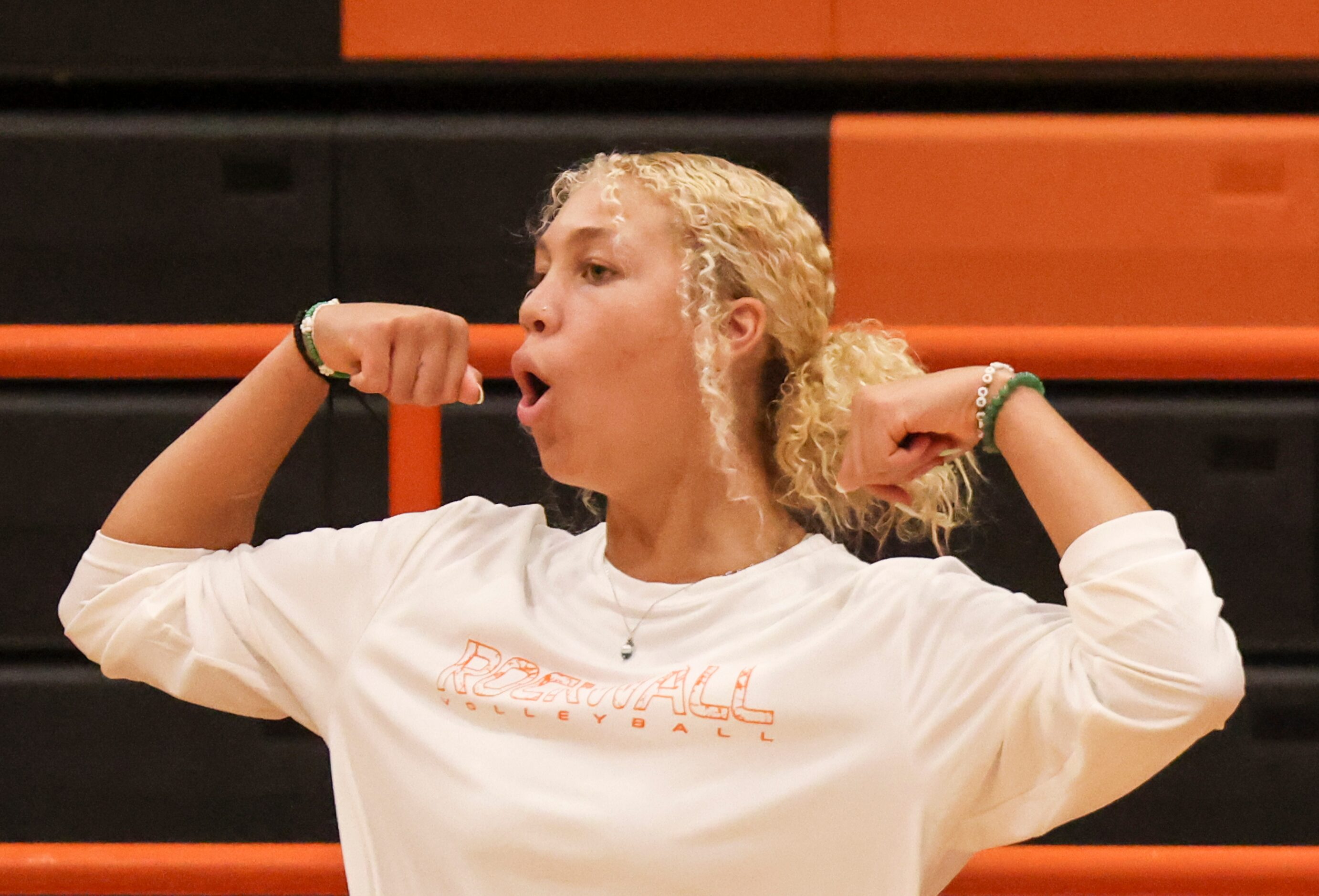 Rockwall High School’s Becky Kelley reacts as the team wins the volley in the volleyball...