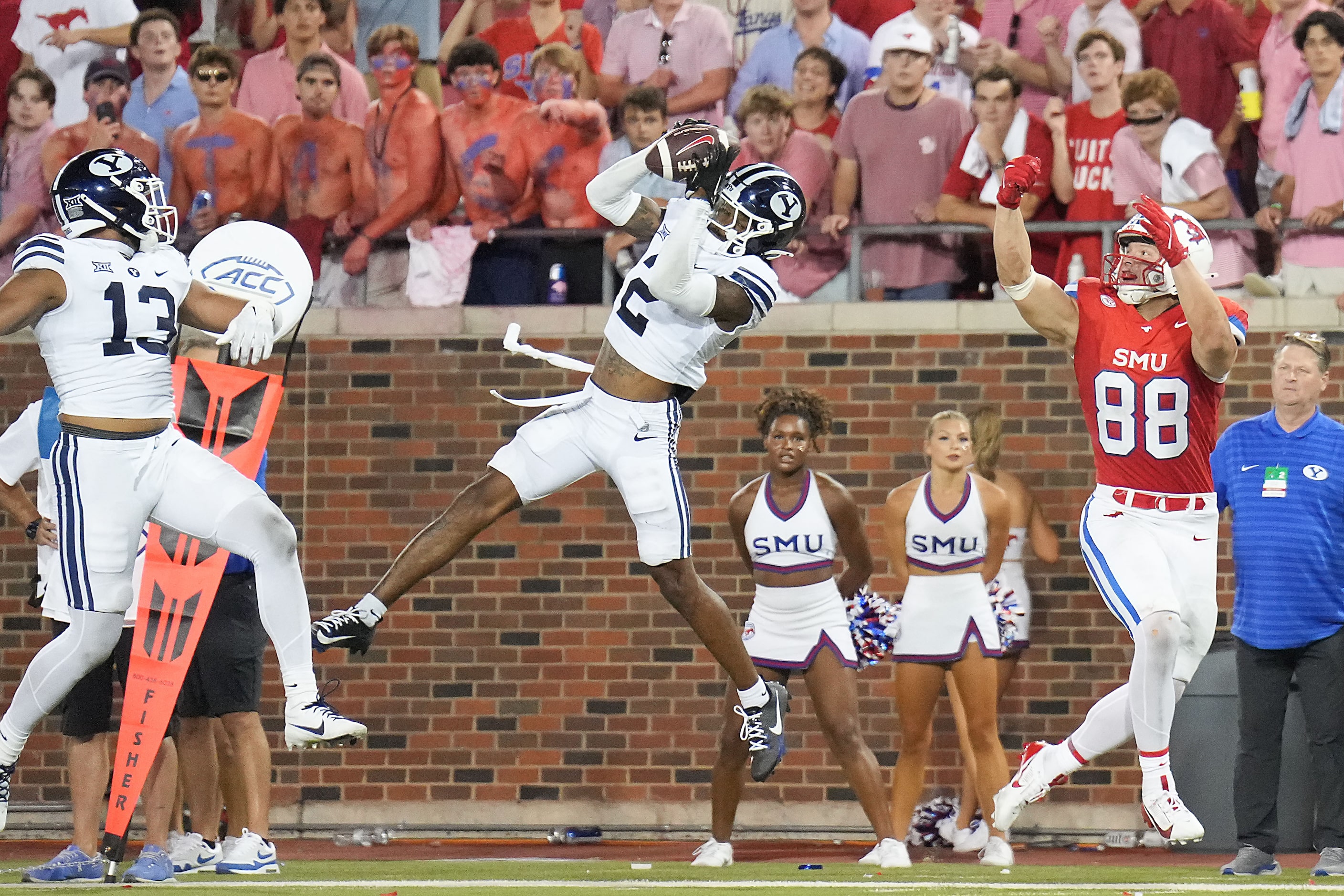 BYU cornerback Marque Collins (2) intercepts a pass intended for SMU tight end Matthew...