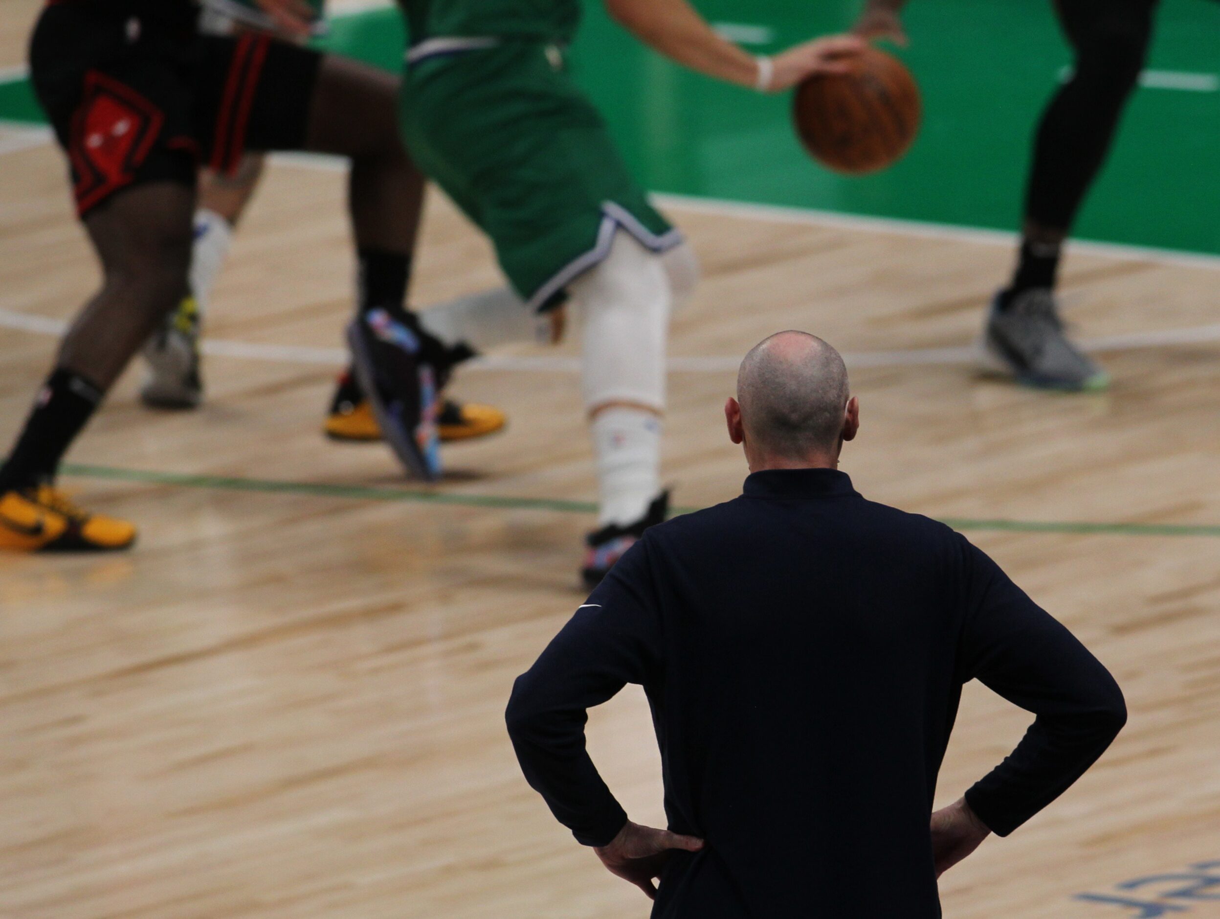 Dallas Mavericks head coach Rick Carlisle looks on from the team bench area during first...