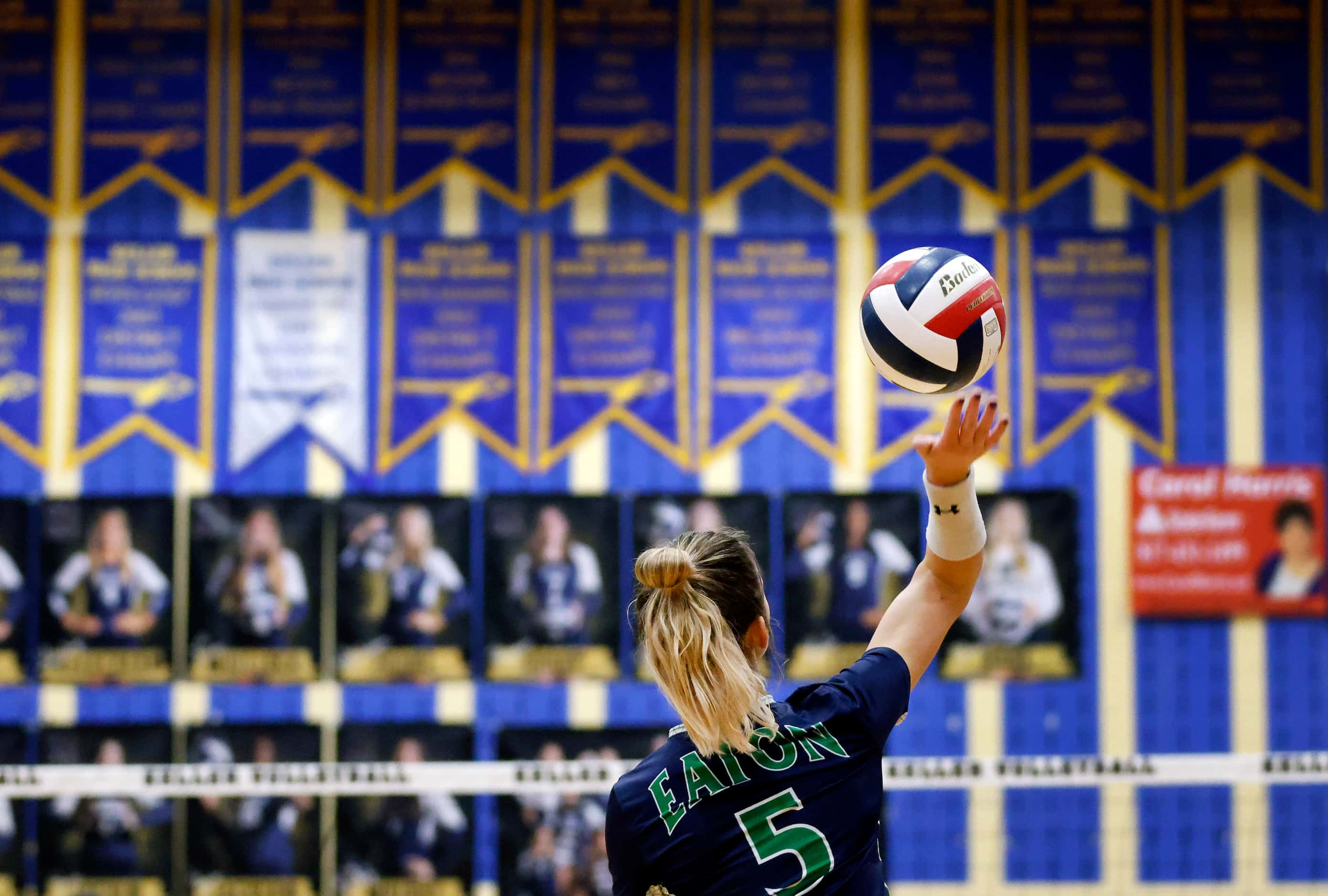 Eaton High’s Emily Simmons (15) serves the ball against Keller High during their volleyball...
