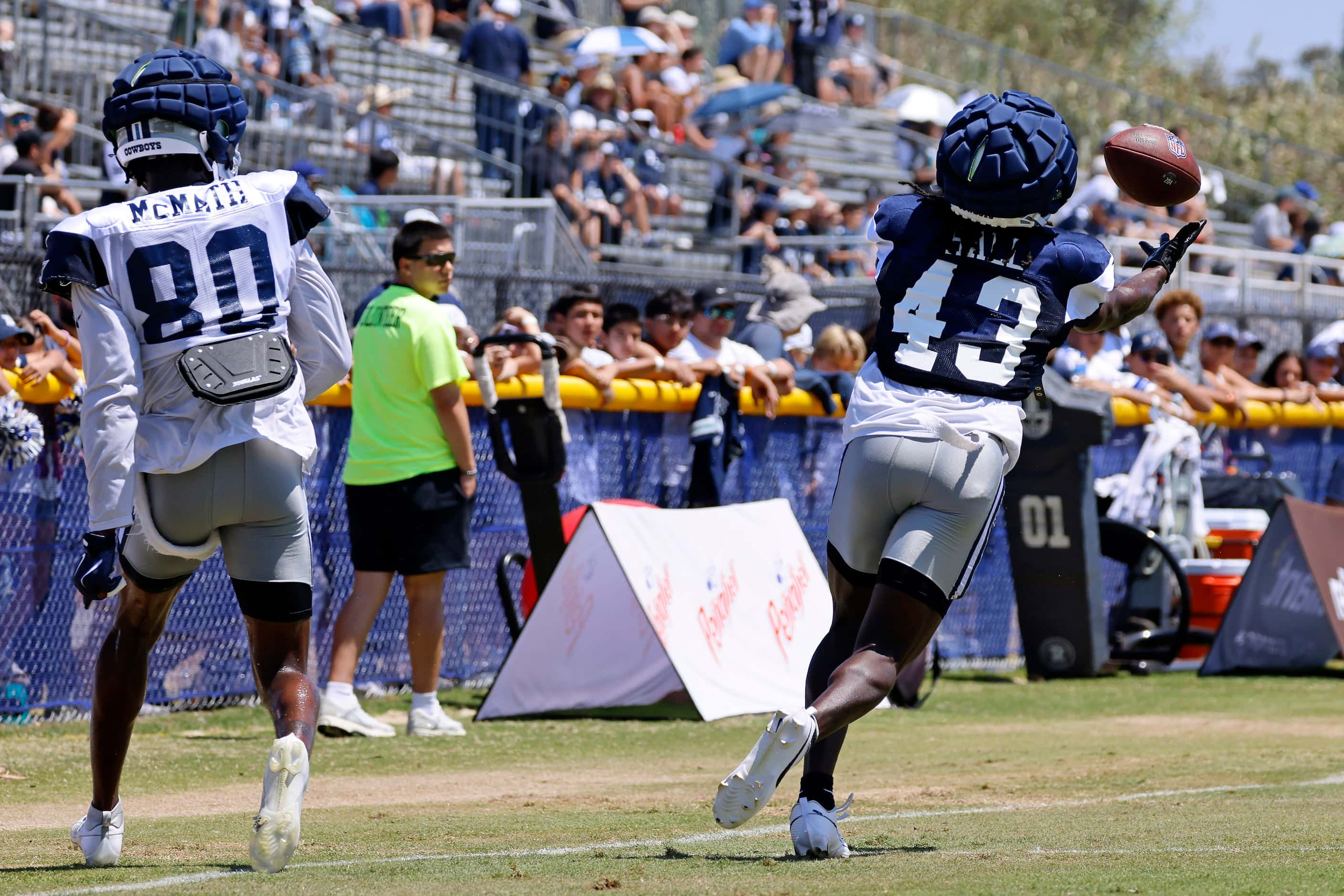 Dallas Cowboys wide receiver Racey McMath (80) has a pass bounce off of him and intercepted...