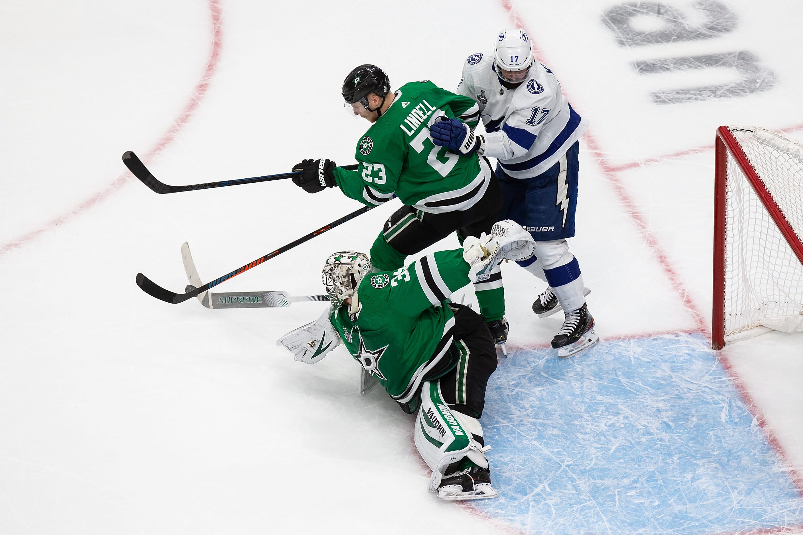 Goaltender Anton Khudobin (35) of the Dallas Stars loses his stick making a save against...