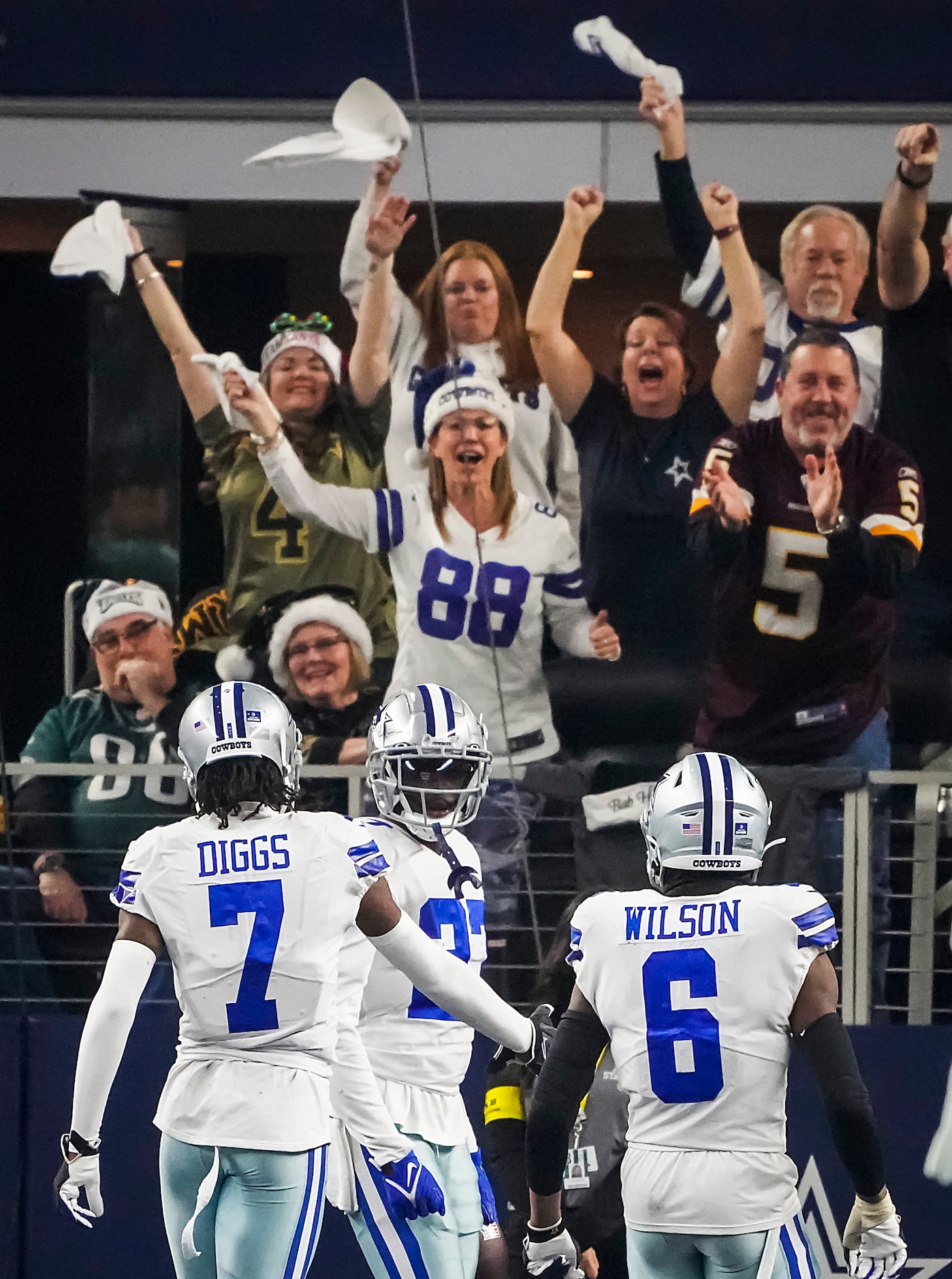 Dallas Cowboys safety Jayron Kearse (27) celebrates with cornerback Trevon Diggs (7) and...