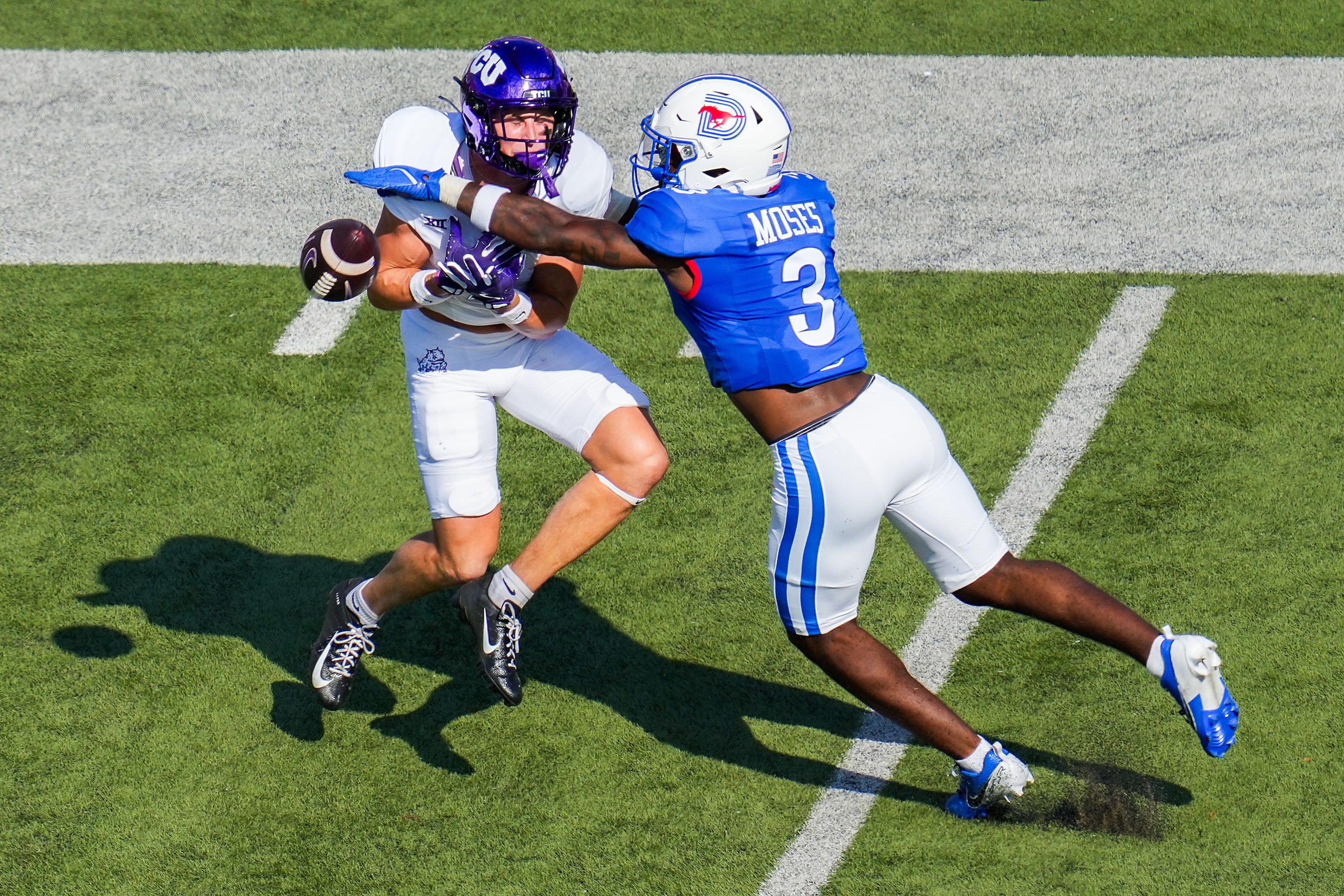 SMU safety Ahmaad Moses (3) breaks up a pass intended for TCU wide receiver JP Richardson...