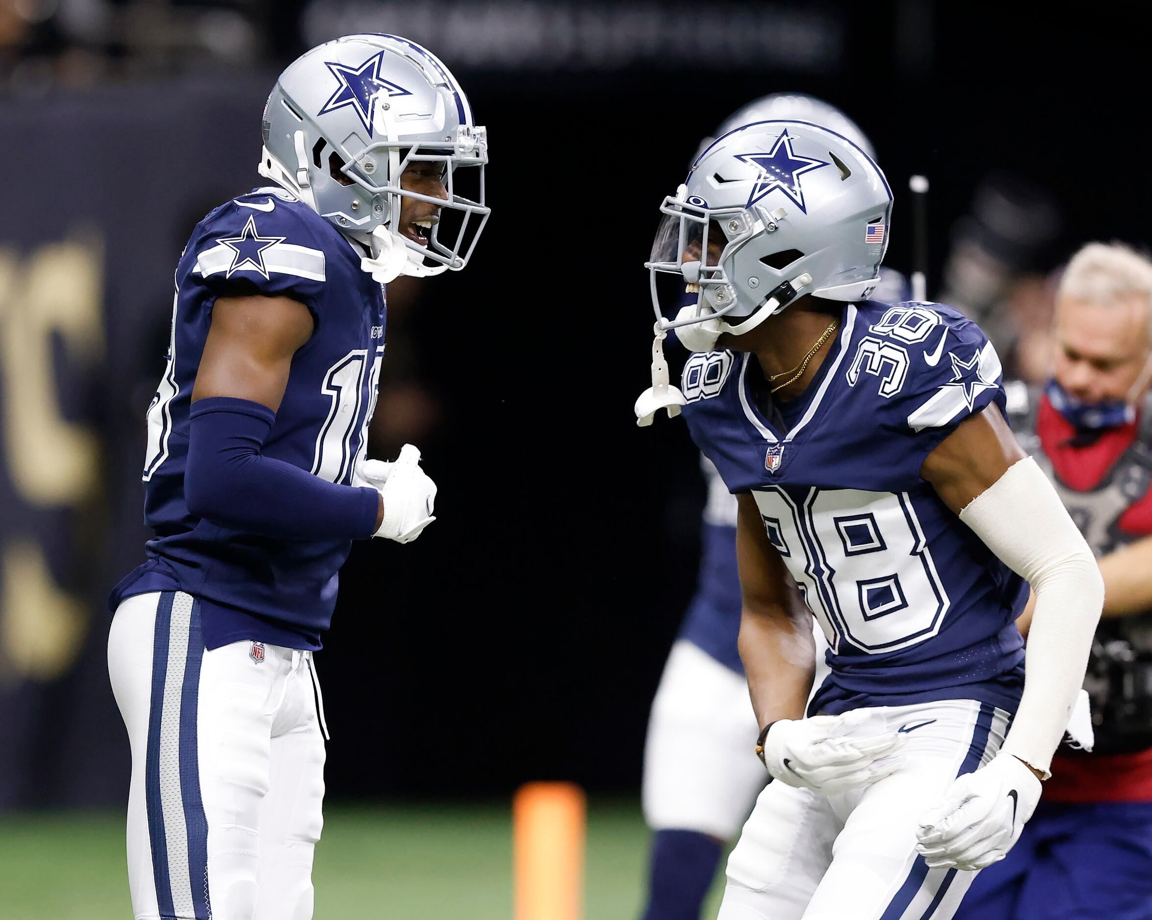 Dallas Cowboys free safety Damontae Kazee (18) is congratulated on his interception by...