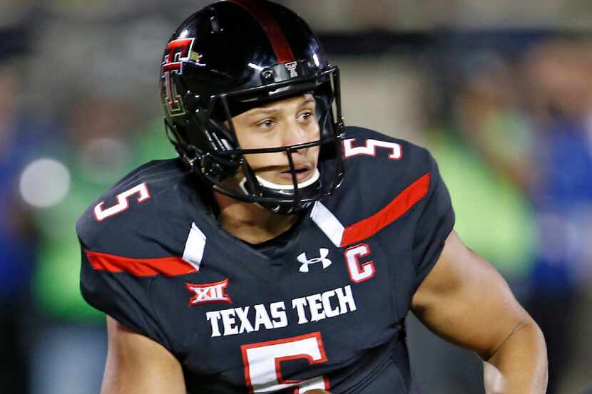 Texas Tech's Patrick Mahomes (5) looks to pass the ball during an NCAA college football game...