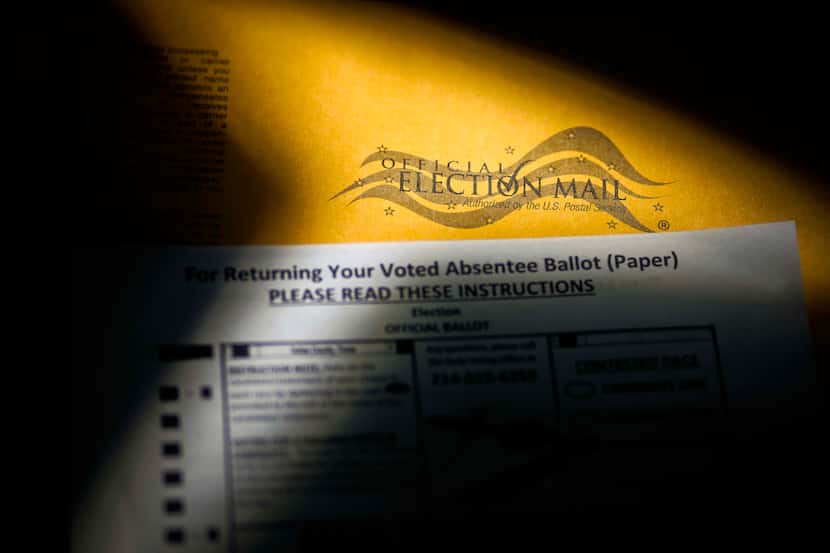 Mail-in absentee ballot materials photographed at the Dallas County Elections Department on...
